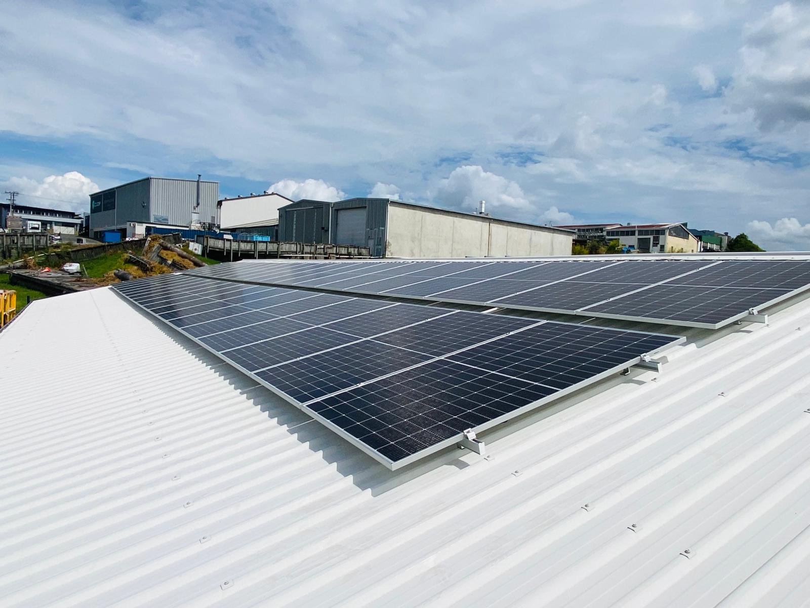 Photovoltaic Solar team installing solar panels on New Zealand home